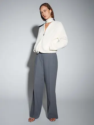 SOMEDAY | Produktname: Strickjacke UMAYAN
Marke: SOMEDAY
Farbe: creme
Kategorien: Mode,Damen

Ärmellänge: Langarm
Ausschnitt: Rundhalsausschnitt
Material: Polyester / Polyamid
Musterung: Unifarben
Passform (Oberbekleidung): Locker
Stil: Pure

Cardigan UMAYAN | 